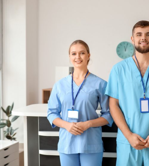 male-and-female-receptionists-in-clinic